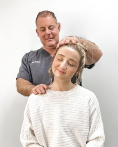 Dr. David Packer chiropractic exam with patient
