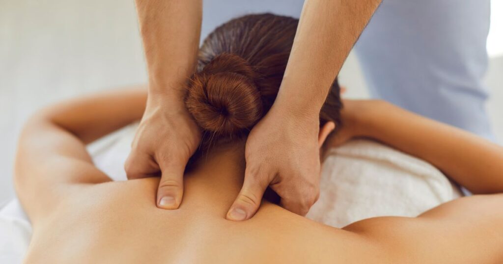 xr:d:DAFBoJhp0zE:2444,j:45037429648,t:23011119 therapist performing deep tissue massage therapy on a patientupper back